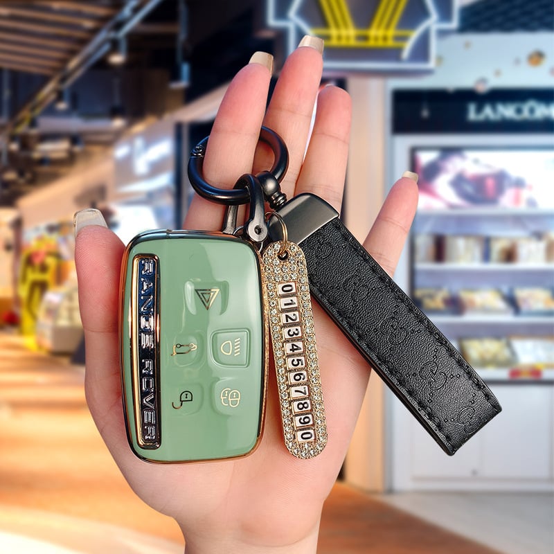 TPU võtmekarp Land Roveri ja Jaguari jaoks, cartoon-stiilis, klambriga kaas