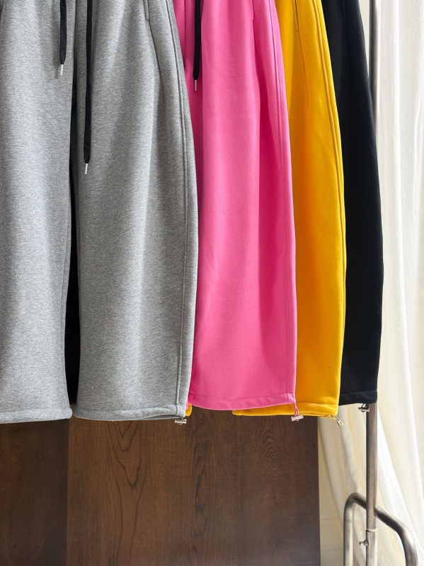 Naiste fleece-kattega puuvillast‑polüestrist sportpüksid, keskosa vöökoht, vaba sirge lõige, paksendatud talveks