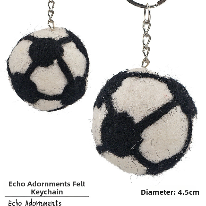 Atslēgu piekariņš no Nepāles vilnas filca – 3D futbols, basketbols un regbi, somas piekariņš no filca (Izcelsme Yiwu; roku darbs; vilna; vasara 2025)