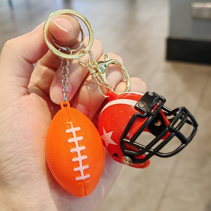 Amerikos futbolo šalmo rakčių pakabukas, plastikinis, modernus minimalistinis stilius