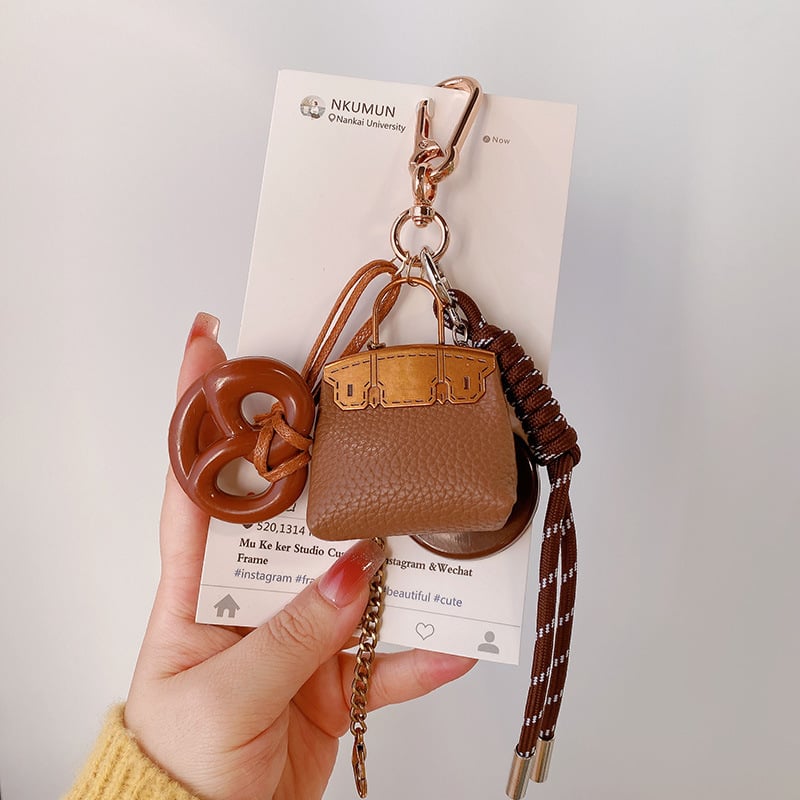 Κλειδοθήκη HD12123: σοκολατένιο μπέγκελ με ύφαντό σκοινί, διακοσμητικό για τσάντες, κορεατικό στυλ. Μάρκα Lemon Peach, μικτά υλικά.