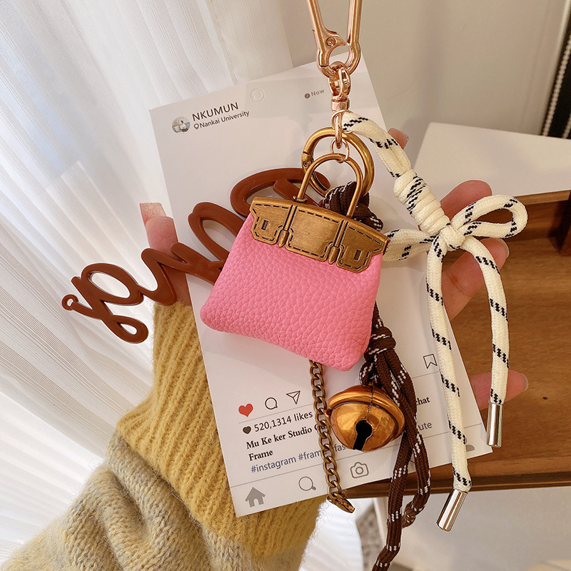 Κλειδοθήκη HD12123: σοκολατένιο μπέγκελ με ύφαντό σκοινί, διακοσμητικό για τσάντες, κορεατικό στυλ. Μάρκα Lemon Peach, μικτά υλικά.