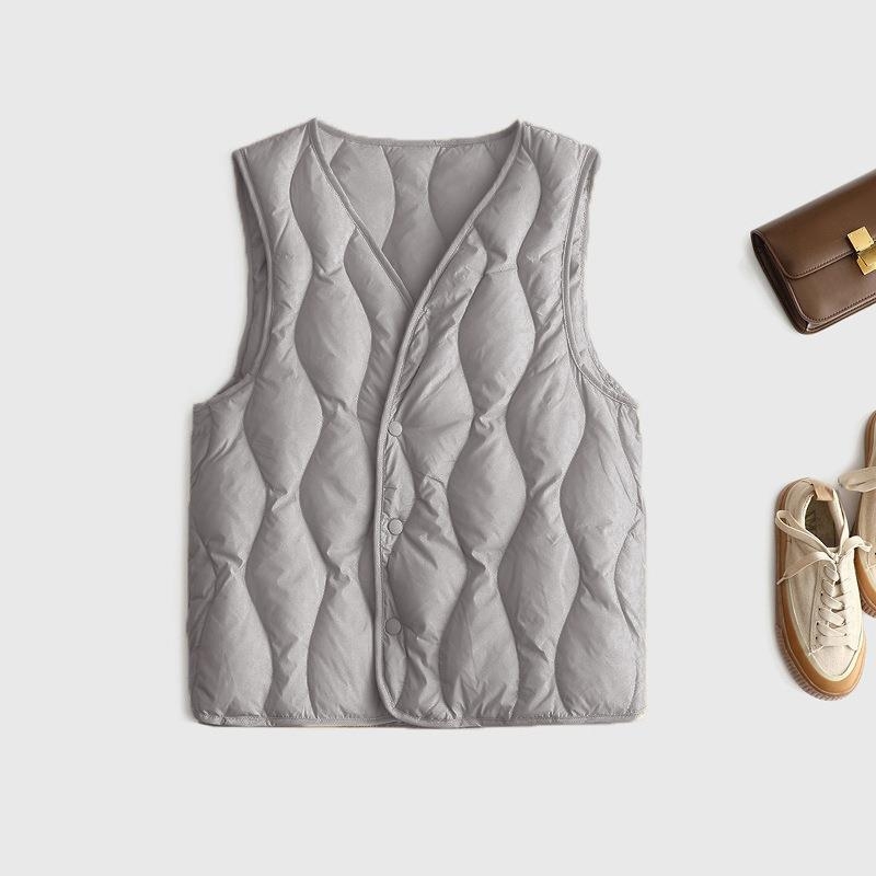 Женска пухена жилетка, тънък силует, пух от бял патешки пух, V-образно деколте, къса дължина, полиестерна тъкан
