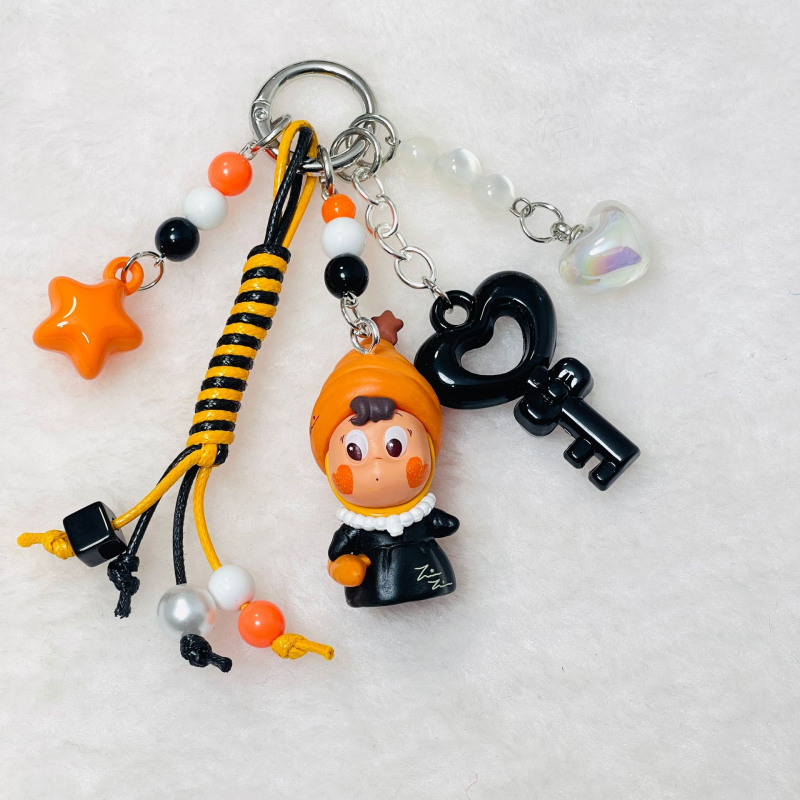 Telefona karājošs rotājums – akrils, zodiaka raksts, karikatūru stils, 2025. ziemā, pielāgojams