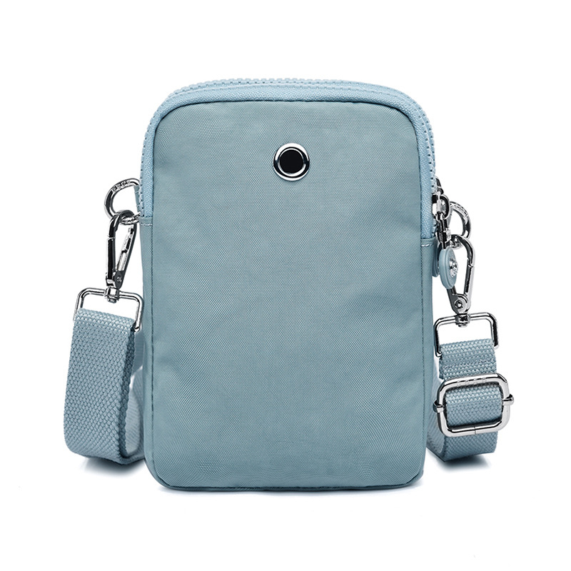 Sievietes crossbody somiņa telefons – neilons, mazs kvadrātveida formāts, vertikāls kvadrāts, rāvējslēdzēja atvērums, iekšējās kabatas ar rāvējslēdzēju (telefons)