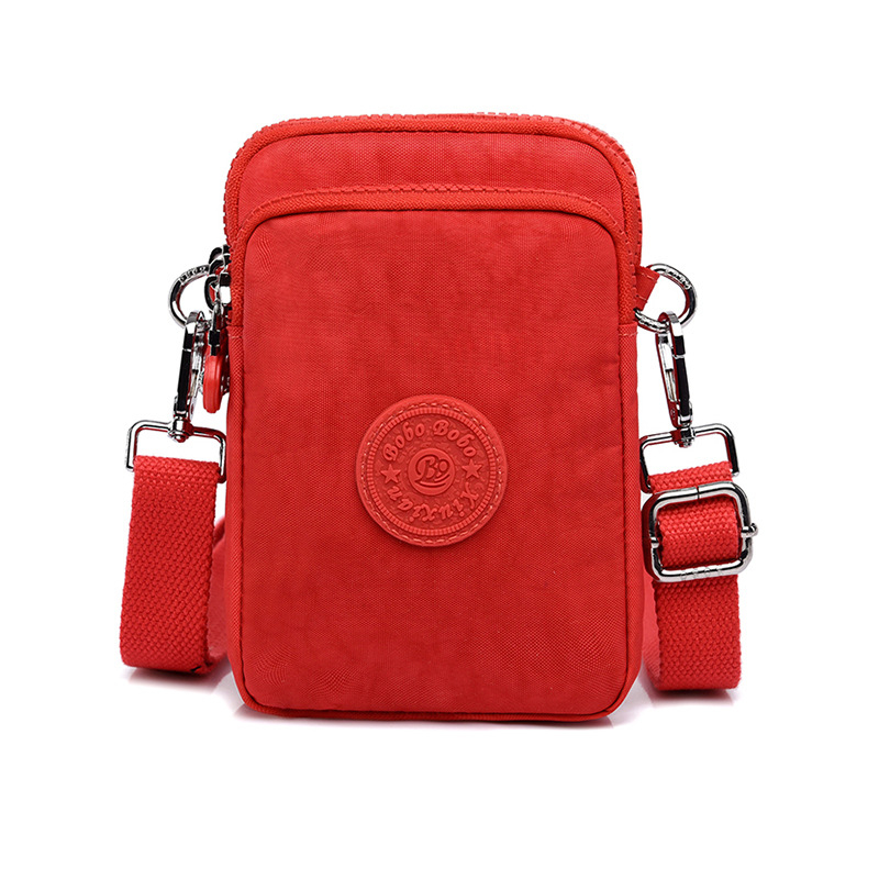 Sievietes crossbody somiņa telefons – neilons, mazs kvadrātveida formāts, vertikāls kvadrāts, rāvējslēdzēja atvērums, iekšējās kabatas ar rāvējslēdzēju (telefons)