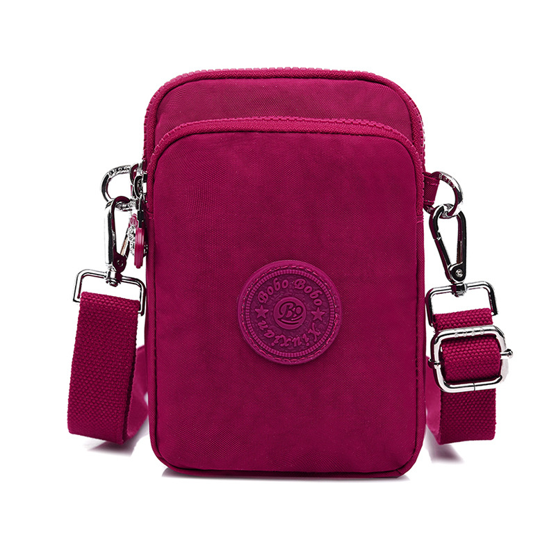 Sievietes crossbody somiņa telefons – neilons, mazs kvadrātveida formāts, vertikāls kvadrāts, rāvējslēdzēja atvērums, iekšējās kabatas ar rāvējslēdzēju (telefons)