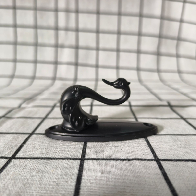 Γάντζος κουρτινας Little Swan από κράμα ψευδαργύρου, μοντέλο QX-121, τύπος: γάντζος, κατάλληλος για κρεμάμενες κουρτίνες, περιλαμβάνει βίδες και καουτσούκ βύσματα