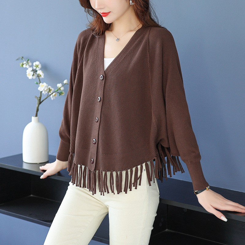 Ζακετάκι πλεκτό με μανίκια τύπου μπατ, V-λαιμό, πλεκτό ύφασμα, βισκόζη 50–70% και πολυεστέρας <30%, κοντό μήκος 40–50 cm