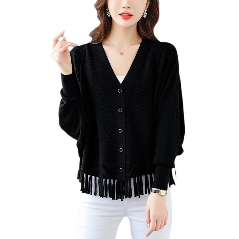 Ζακετάκι πλεκτό με μανίκια τύπου μπατ, V-λαιμό, πλεκτό ύφασμα, βισκόζη 50–70% και πολυεστέρας <30%, κοντό μήκος 40–50 cm