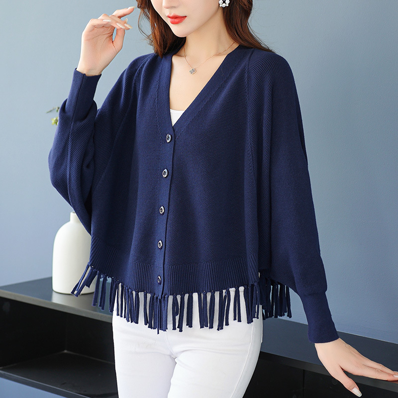 Ζακετάκι πλεκτό με μανίκια τύπου μπατ, V-λαιμό, πλεκτό ύφασμα, βισκόζη 50–70% και πολυεστέρας <30%, κοντό μήκος 40–50 cm