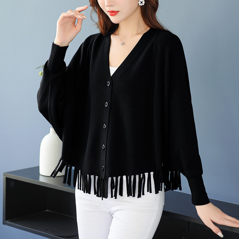 Ζακετάκι πλεκτό με μανίκια τύπου μπατ, V-λαιμό, πλεκτό ύφασμα, βισκόζη 50–70% και πολυεστέρας <30%, κοντό μήκος 40–50 cm