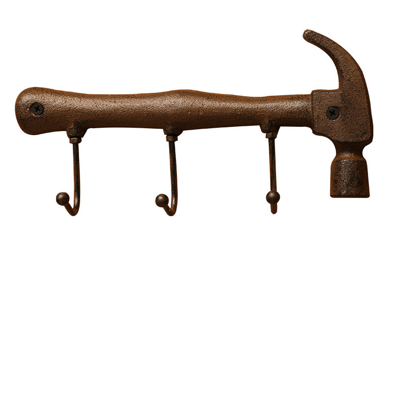 Kalapács alakú falidísz öntöttvasból, beltéri dekoráció