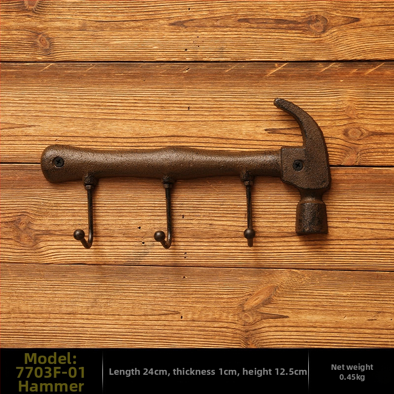 Kalapács alakú falidísz öntöttvasból, beltéri dekoráció