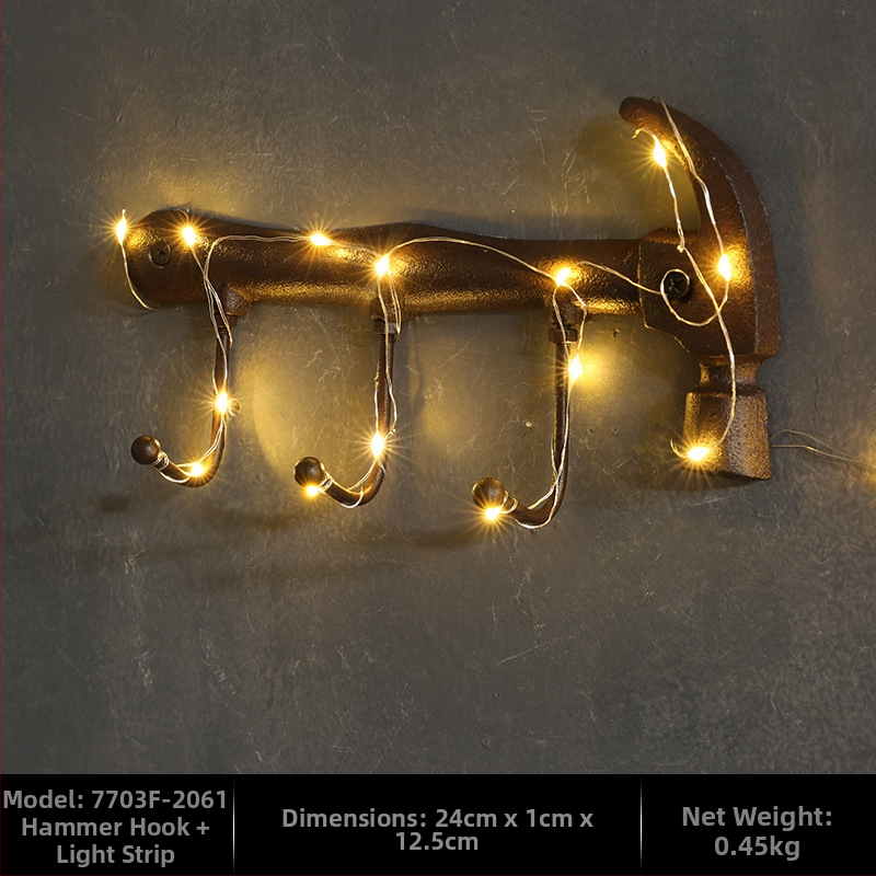 Kalapács alakú falidísz öntöttvasból, beltéri dekoráció