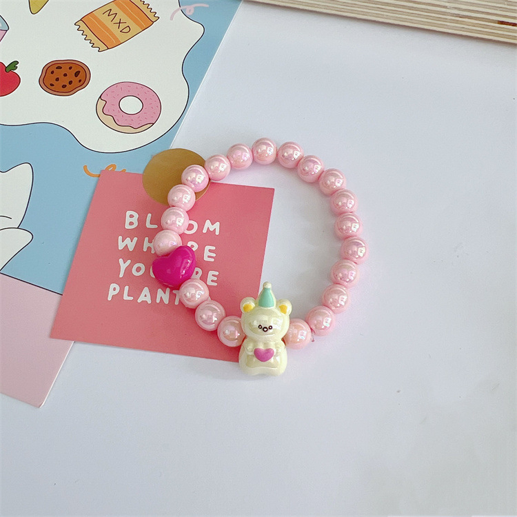 Детска гривна с мъниста в сърцевидна форма и имитационни перли