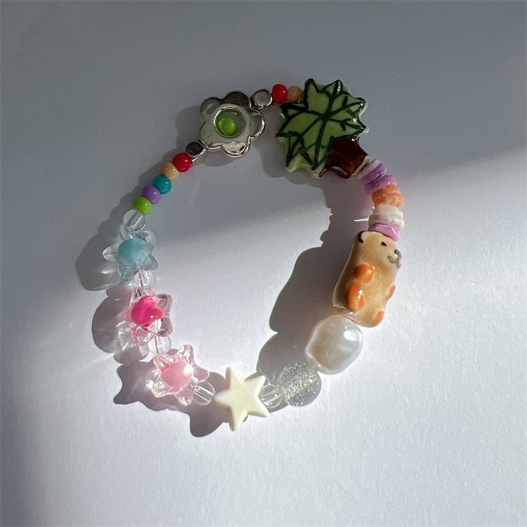 Детска гривна с мъниста в сърцевидна форма и имитационни перли