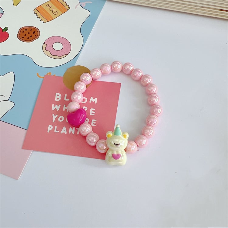 Детска гривна с мъниста в сърцевидна форма и имитационни перли