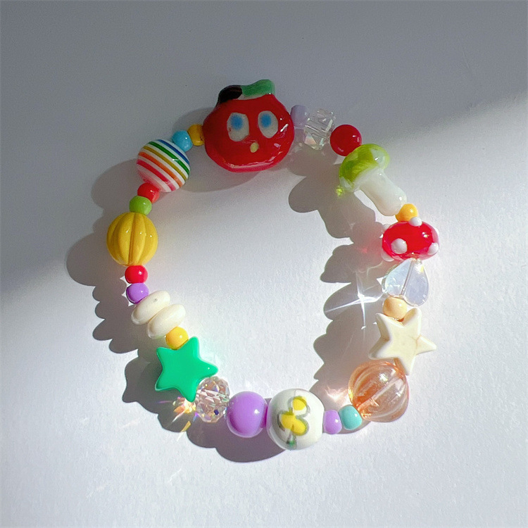 Детска гривна с мъниста в сърцевидна форма и имитационни перли