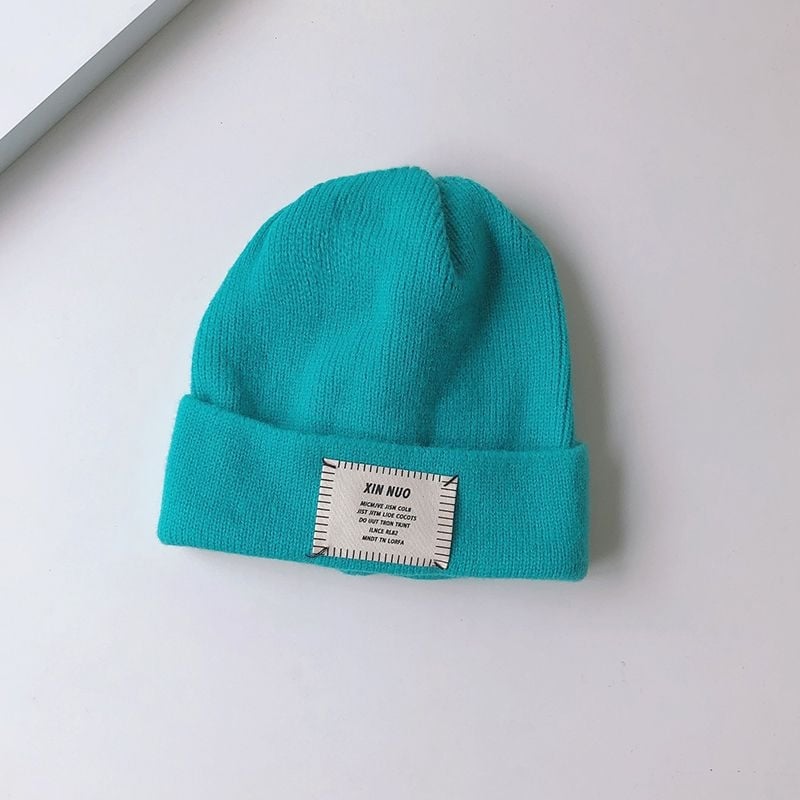 Dječja vunena kapa, plišani materijal, dob 0–6 mjeseci, proljeće 2025