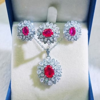 Három darabos ékszerszett: ezüstözött bevonat, elektroplakálás; fülbevalók, medálos nyaklánc és gyűrű szintetikus kövekkel; virágos dizájn; Kangzhixin ékszerek