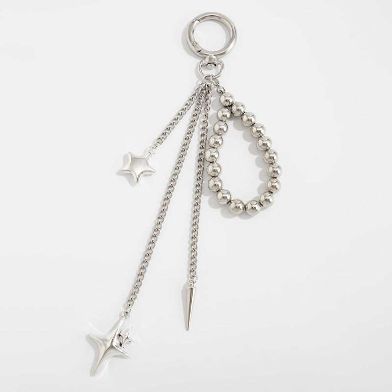 Sirds formas metāla atslēgu piekārts somai ar pērlīšu pītumu