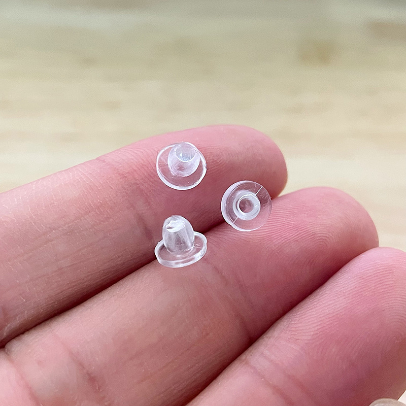 Nagy háromszögű fülcsipesz alátét, fájdalomcsillapító párna, műanyag, ékszerkiegészítők, 2021 tél