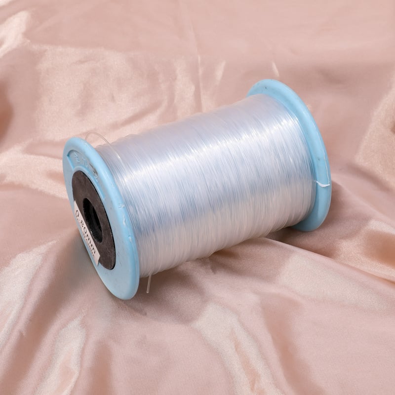 Pērļu vads rokdarbu gredieniem, caurspīdīga ultra-smalka kristāla līnija, neelastīga, ar spandeksa pamatu