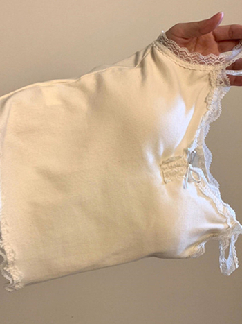 Bustier top ar mežģīņu apdari, divas siksnas, 100% kokvilna, A līnijas siluets, īss garums 40–50 cm