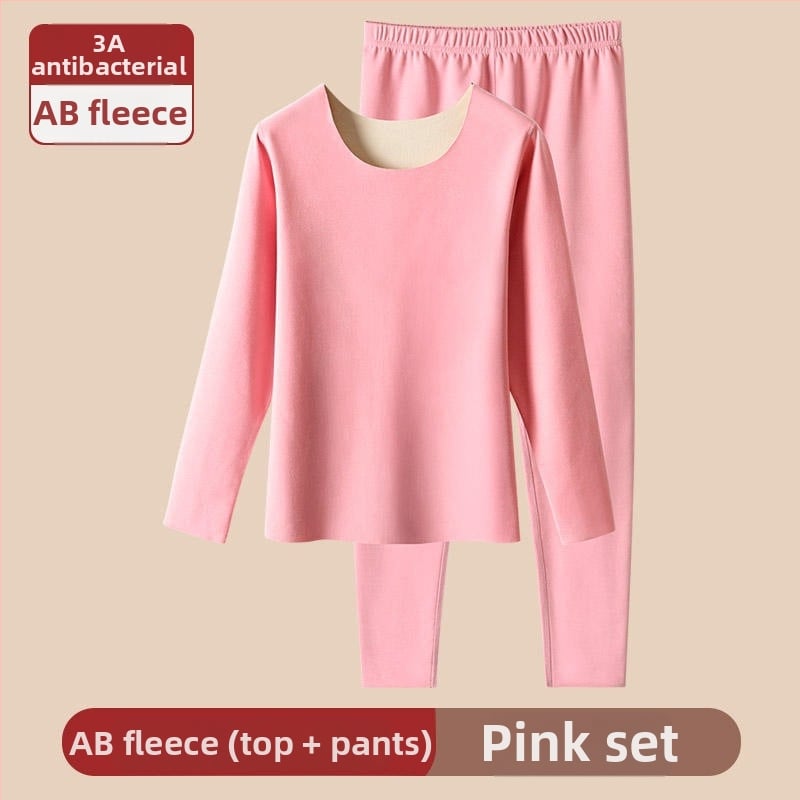 Ženski bešavni termalni set s veluru unutrašnjim slojem, poliester, 201–250 g/m²; grijanje i oblikovanje tijela (kontrola trbuha, podizanje stražnjice); gornji dio s okruglim izrezom, dugi rukavi, hlače.