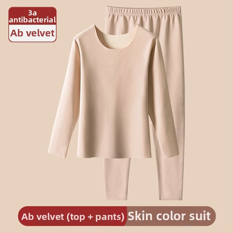 Ženski bešavni termalni set s veluru unutrašnjim slojem, poliester, 201–250 g/m²; grijanje i oblikovanje tijela (kontrola trbuha, podizanje stražnjice); gornji dio s okruglim izrezom, dugi rukavi, hlače.