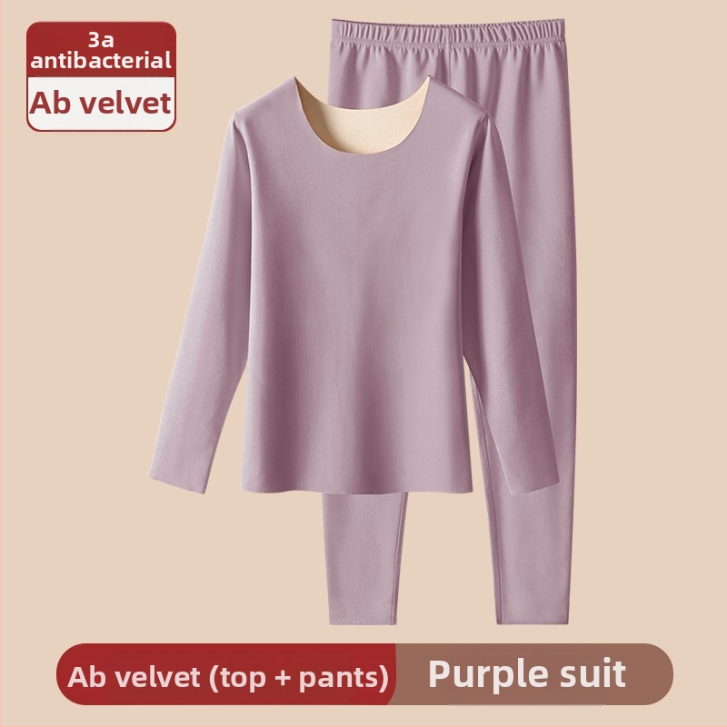 Ženski bešavni termalni set s veluru unutrašnjim slojem, poliester, 201–250 g/m²; grijanje i oblikovanje tijela (kontrola trbuha, podizanje stražnjice); gornji dio s okruglim izrezom, dugi rukavi, hlače.