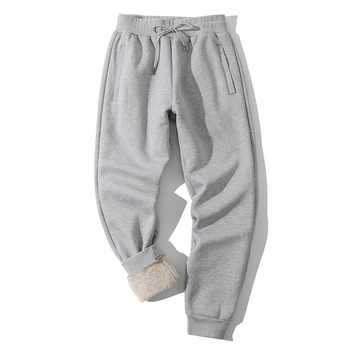 Zimske muške sportske hlače od pamuka s fleece podstavom, opuštenog kroja, širokih nogavica, srednje visine struka, remen