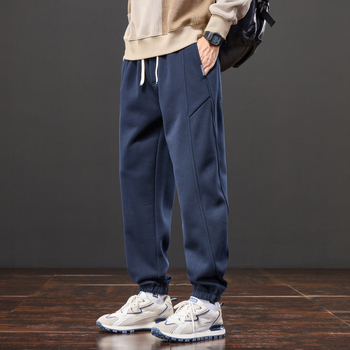 Férfiak számára lazán szabott melegítőnadrág, elasztikus derék, fleece béléses, kötött sportnadrág minden évszakra