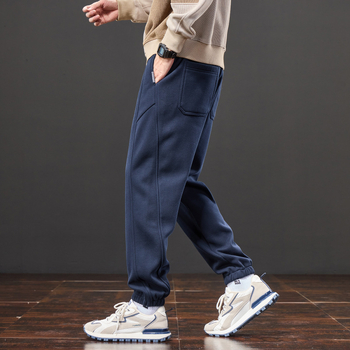 Férfiak számára lazán szabott melegítőnadrág, elasztikus derék, fleece béléses, kötött sportnadrág minden évszakra