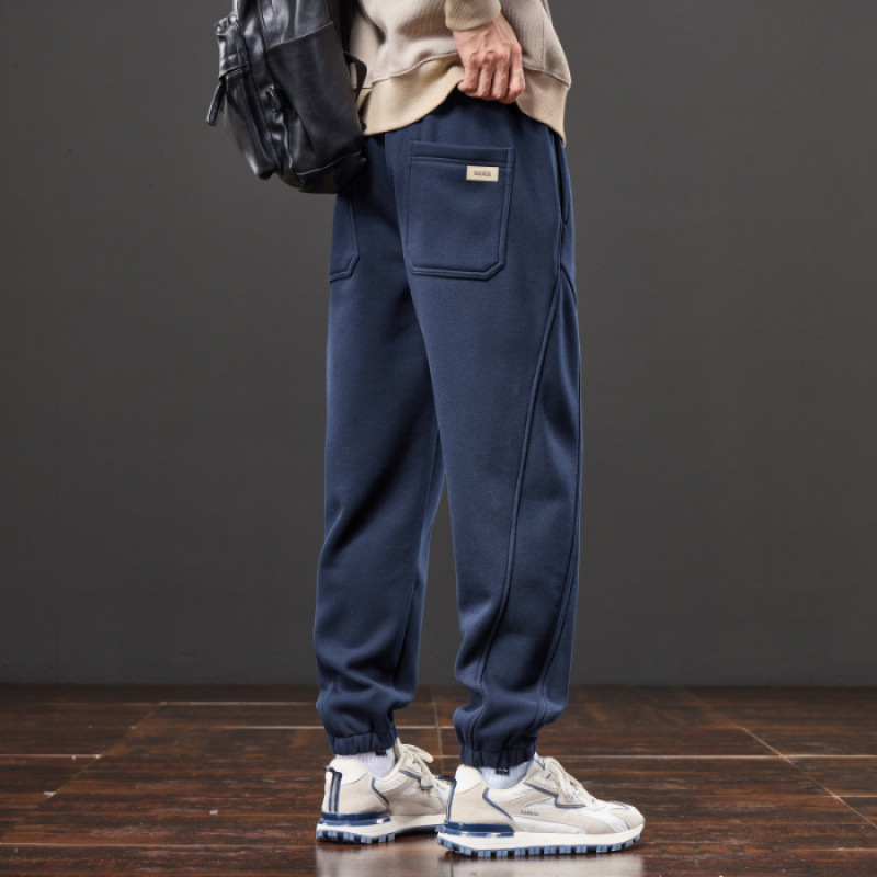 Férfiak számára lazán szabott melegítőnadrág, elasztikus derék, fleece béléses, kötött sportnadrág minden évszakra