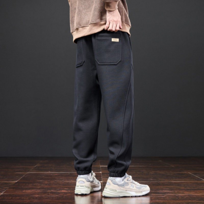 Férfiak számára lazán szabott melegítőnadrág, elasztikus derék, fleece béléses, kötött sportnadrág minden évszakra