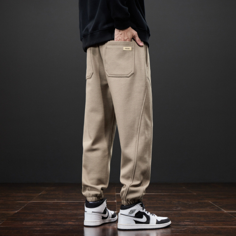 Férfiak számára lazán szabott melegítőnadrág, elasztikus derék, fleece béléses, kötött sportnadrág minden évszakra