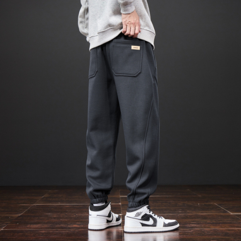 Férfiak számára lazán szabott melegítőnadrág, elasztikus derék, fleece béléses, kötött sportnadrág minden évszakra