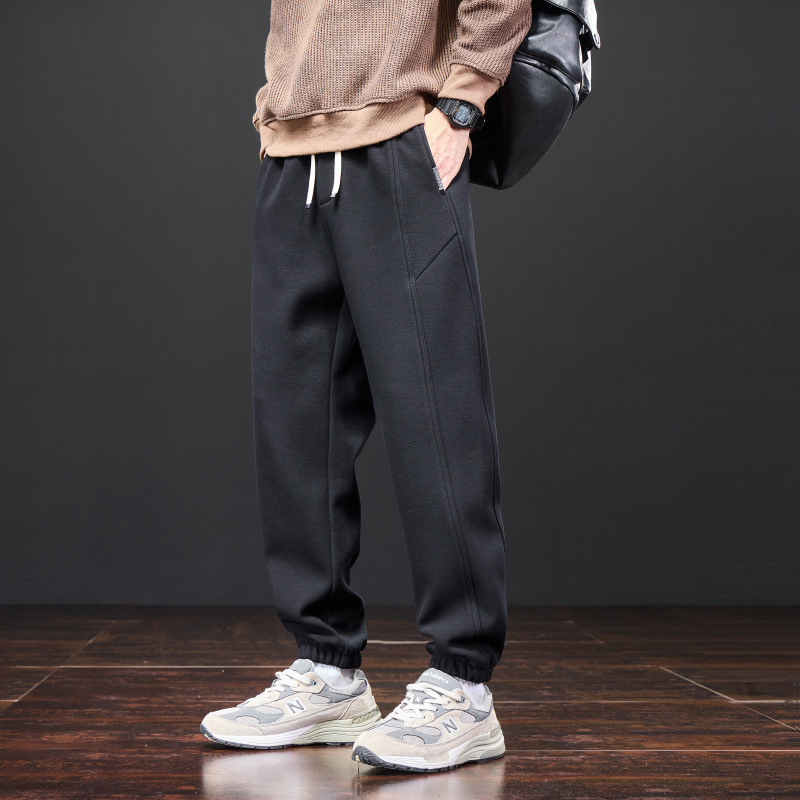 Férfiak számára lazán szabott melegítőnadrág, elasztikus derék, fleece béléses, kötött sportnadrág minden évszakra