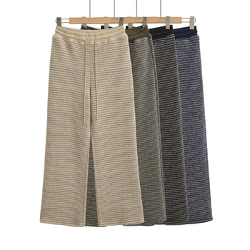 Női csíkos széles lábú nadrág, poliészter-spandex keverék, elasztikus derék húzózsinórral, zsebek, mindennapi streetwear.