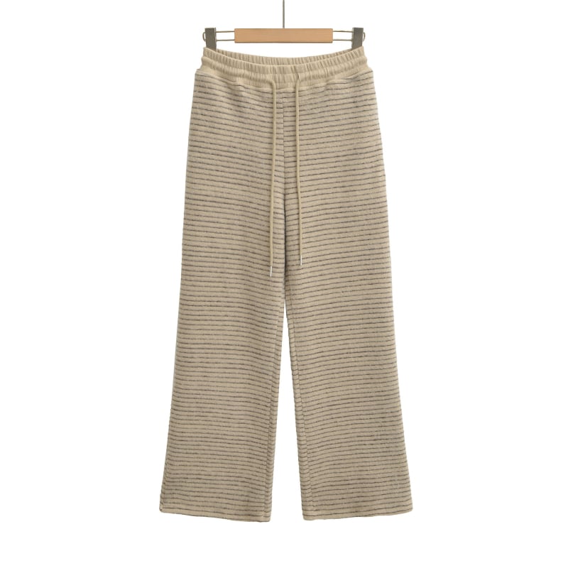 Női csíkos széles lábú nadrág, poliészter-spandex keverék, elasztikus derék húzózsinórral, zsebek, mindennapi streetwear.