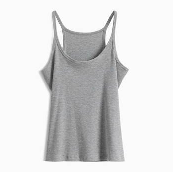 Bez piedurknēm top ar U kaklu un ribveida siksniņām, I-siluetes veste slāņošanai, standarta garums, vienkrāsains poliestera 70–80%.