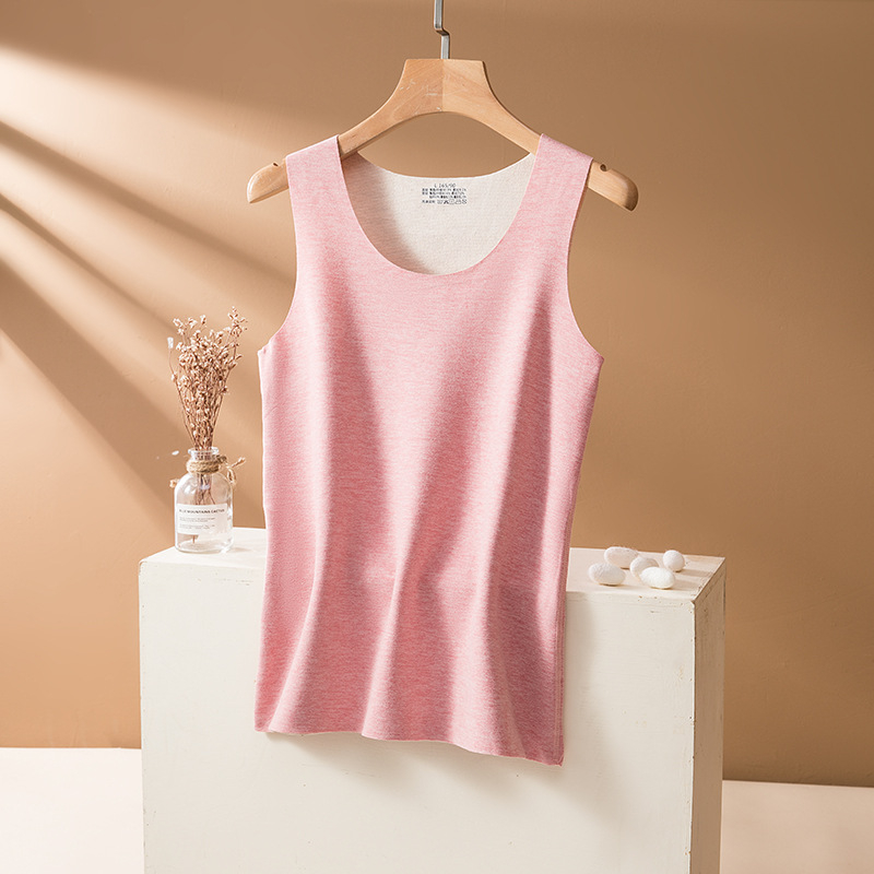 Topli vuneni svilenkasti prsluk, dvostruki melirani materijal, fleece podstava, okrugli ovratnik, debeli materijal 201-250 g/m², 90-95% poliestera.