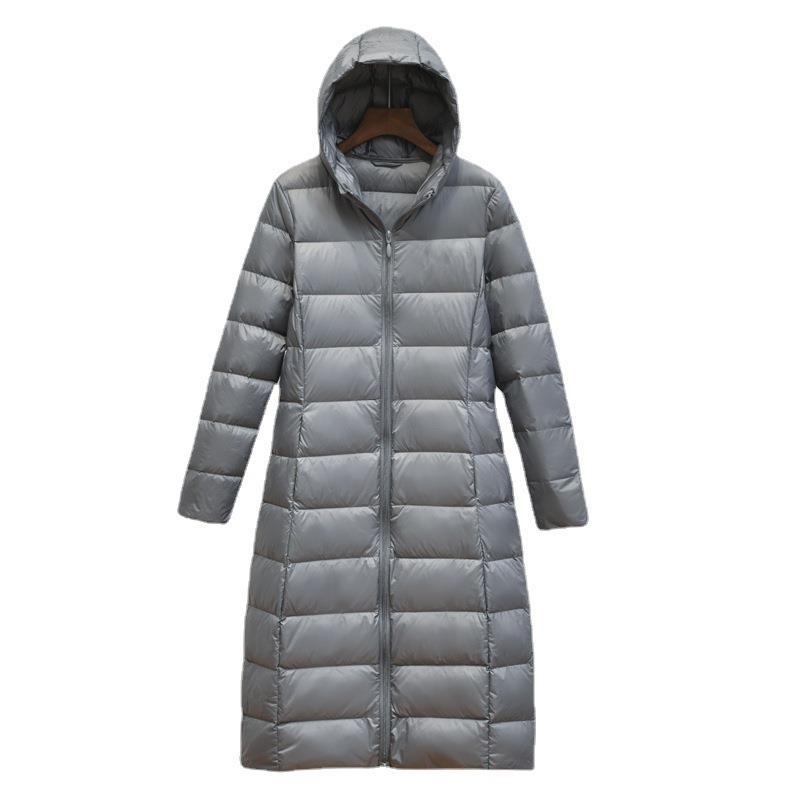 Sieviešu ziemas jaka ar kapuci, korejiešu stilā, garā līdz ceļgaliem, brīvā piegriezuma, pildījums no balta pīļu pūka