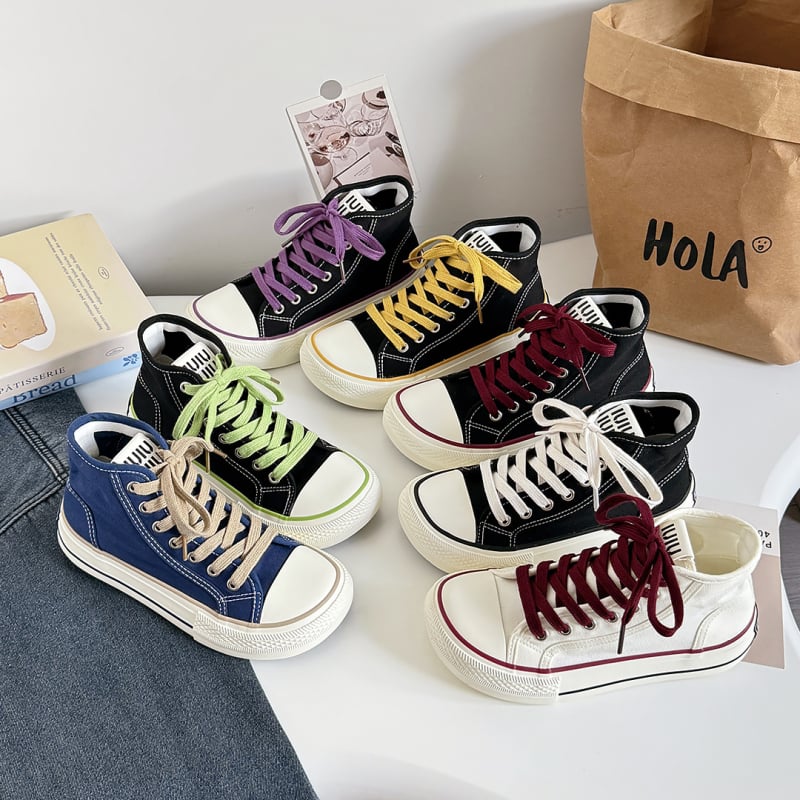 Naiste kanvasjalanõud madala ülemusega, vulkaniseeritud kummist talla, hingav puuvillane vooder