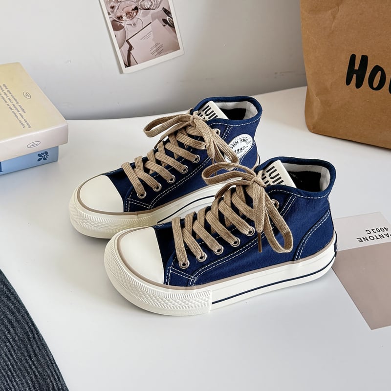 Naiste kanvasjalanõud madala ülemusega, vulkaniseeritud kummist talla, hingav puuvillane vooder