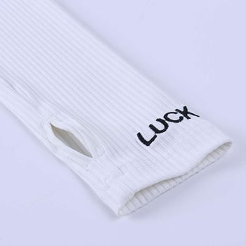 Ženski dvodijelni komplet: gornji dio s visokim ovratnikom, šav s literama i zatvaračem, dugi rukavi; uske hlače; poliester 71-80%