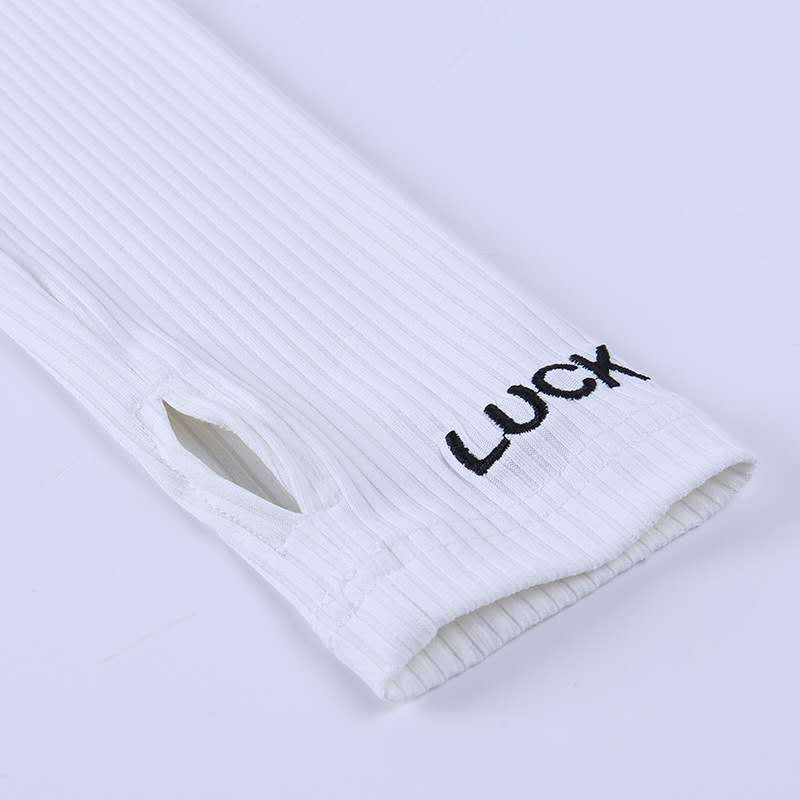 Ženski dvodijelni komplet: gornji dio s visokim ovratnikom, šav s literama i zatvaračem, dugi rukavi; uske hlače; poliester 71-80%