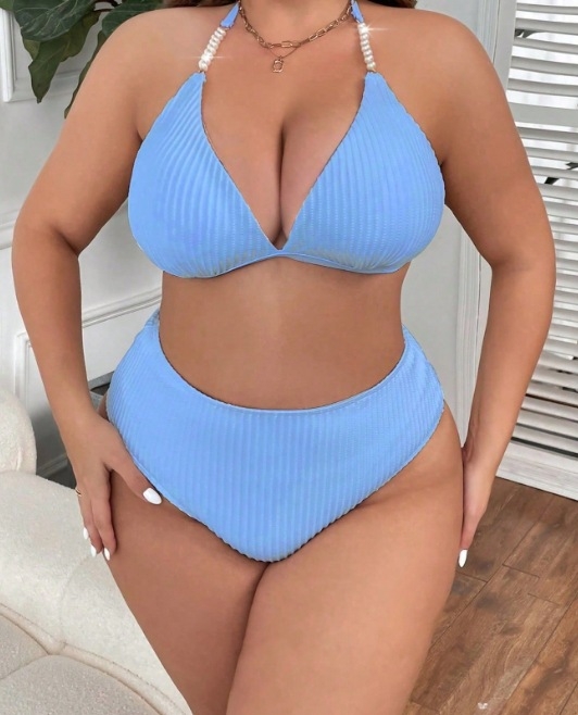 Bikini set s tankim trakama i otvorenim leđima, visokim strukom, s uloškom za grudni dio; materijal: najlon-elastan; podstava: poliester-elastan; težina 200 g